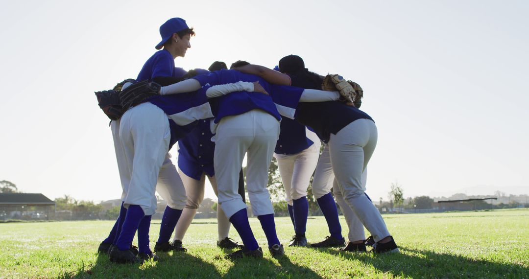 Youth Baseball Team Huddling on Sunny Day Before Game - Free Images, Stock Photos and Pictures on Pikwizard.com