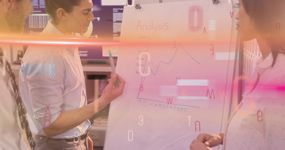 Team Analyzing Data Trends on Chart in Modern Office Meeting