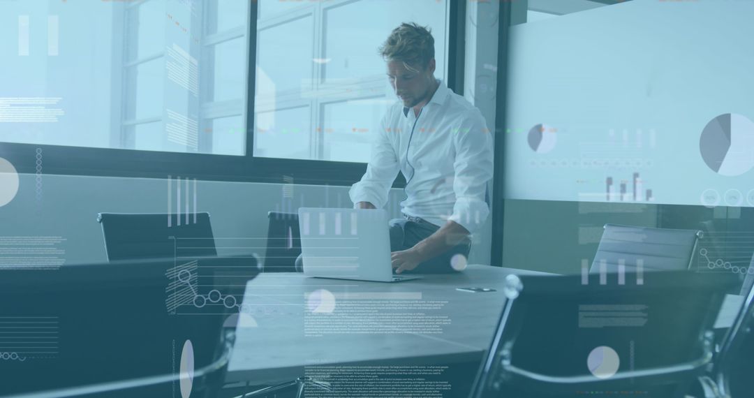 Businessman Analyzing Data on Laptop with Digital Interfaces