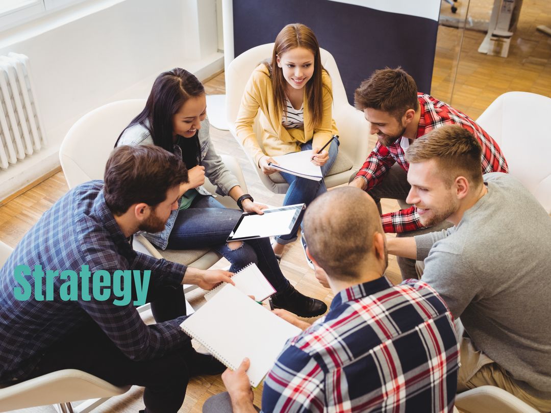 Diverse Team Collaborating on Business Strategy Indoors