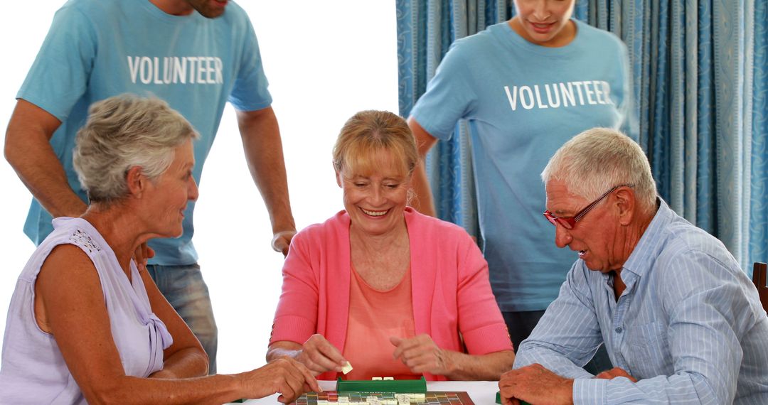 Seniors Playing Board Game with Volunteers in Community Center - Free Images, Stock Photos and Pictures on Pikwizard.com