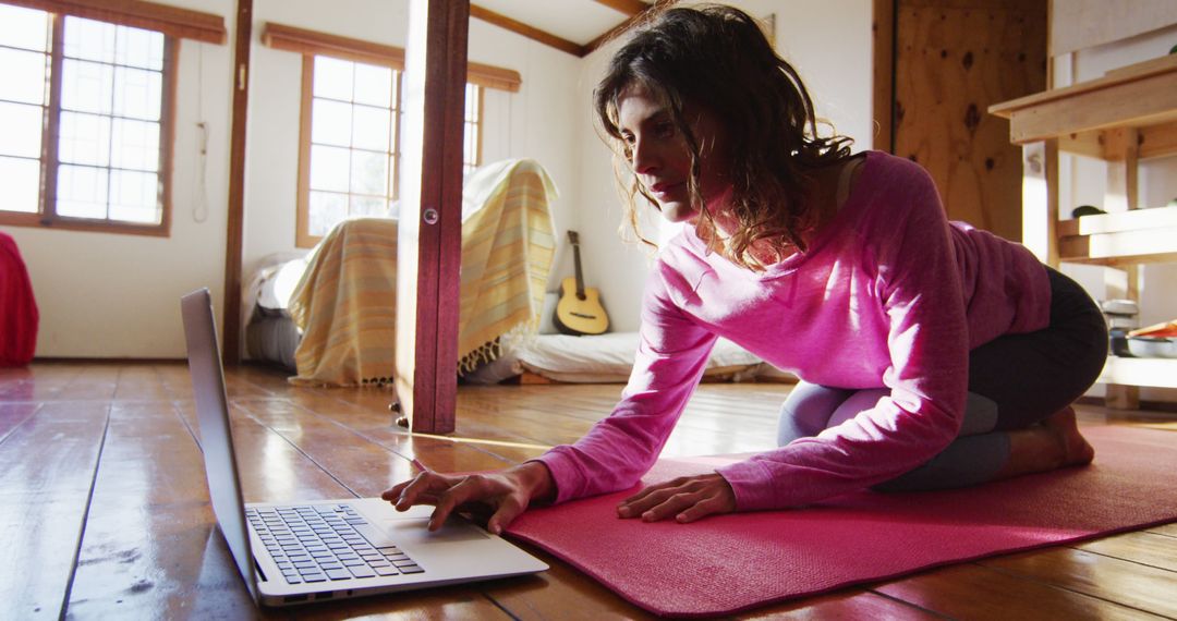 Woman Practicing Yoga at Home Using Laptop for Online Class - Free Images, Stock Photos and Pictures on Pikwizard.com