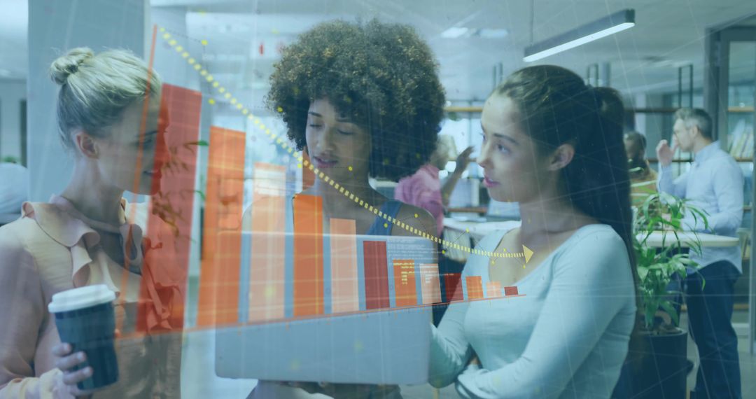 Diverse Female Team Analyzing Data in Modern Office with Chart Overlay