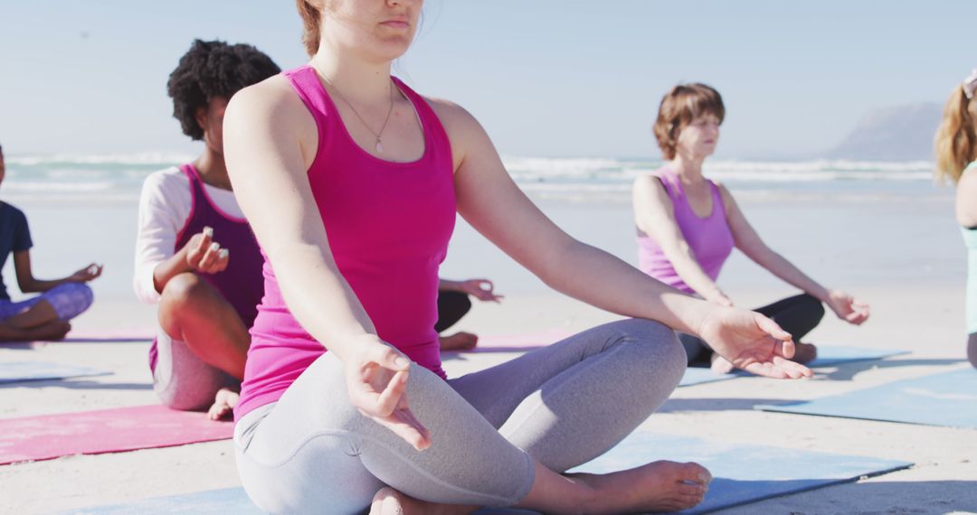 Group Practicing Yoga Meditation on Beach with Scenic Ocean View - Free Images, Stock Photos and Pictures on Pikwizard.com