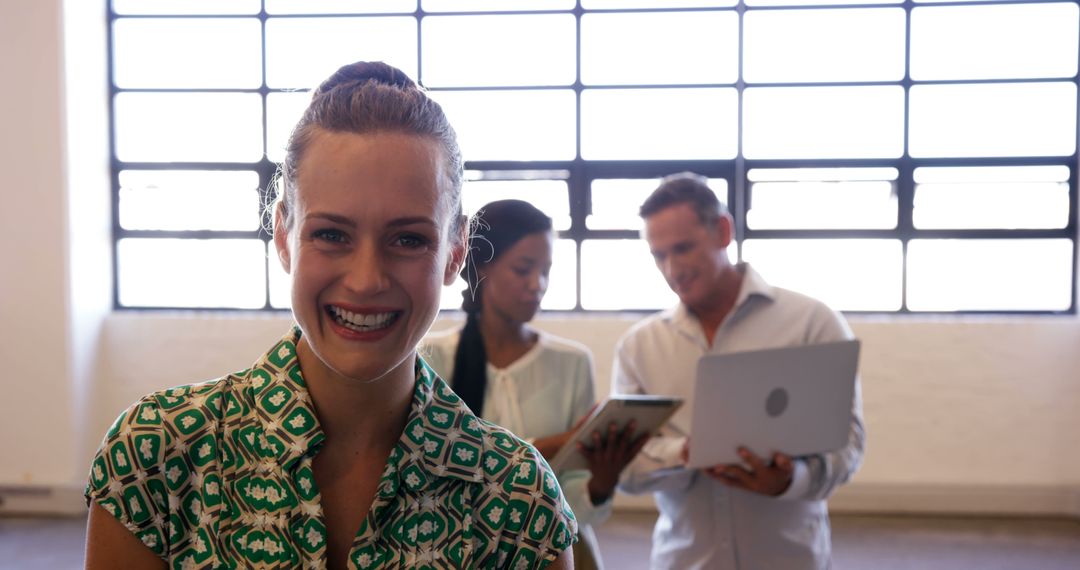 Smiling Businesswoman in Modern Casual Workspace
