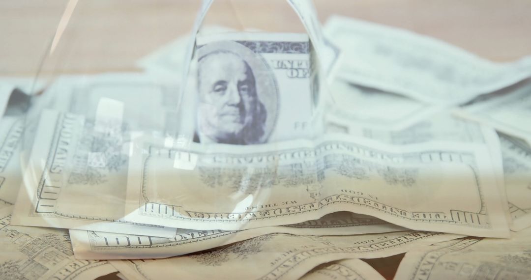 Business Concept: Banknotes with Hourglass Overlay