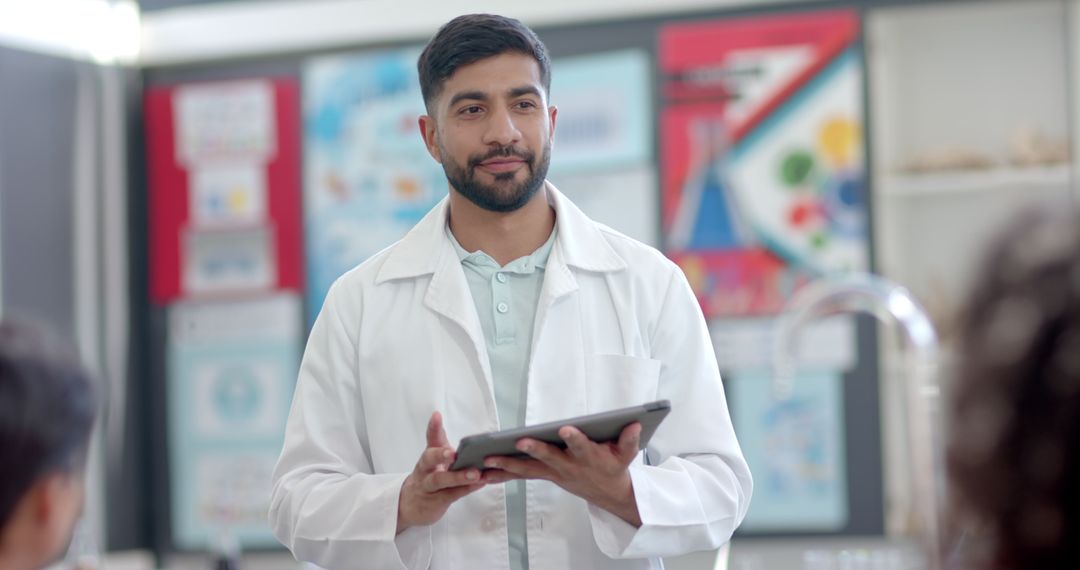 Science Teacher Engaging Class with Tablet Technology