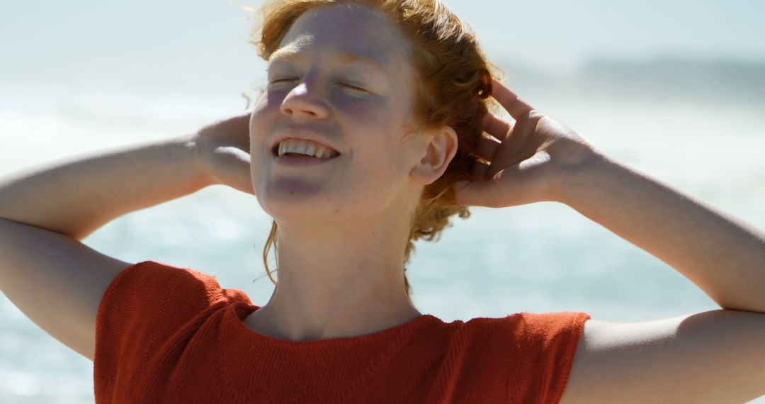 Joyful Person Enjoying Beach in Summer - Free Images, Stock Photos and Pictures on Pikwizard.com