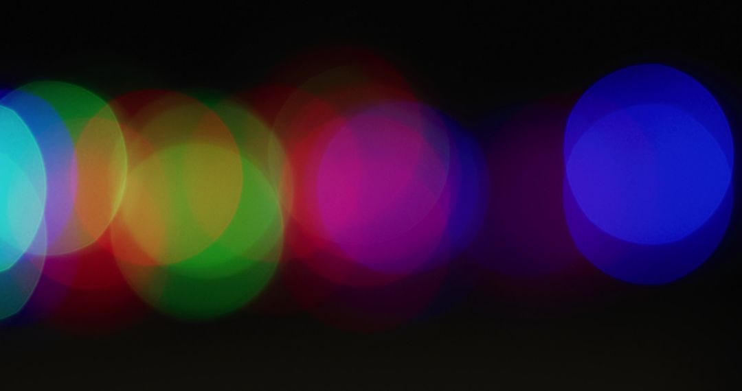 Colorful Bokeh Lights Against Black Background - Free Images, Stock Photos and Pictures on Pikwizard.com