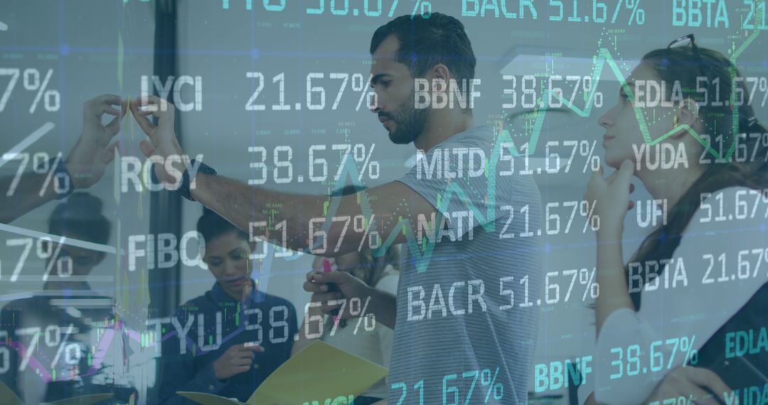 Team Analyzing Financial Data with Stock Market Projections - Free Images, Stock Photos and Pictures on Pikwizard.com