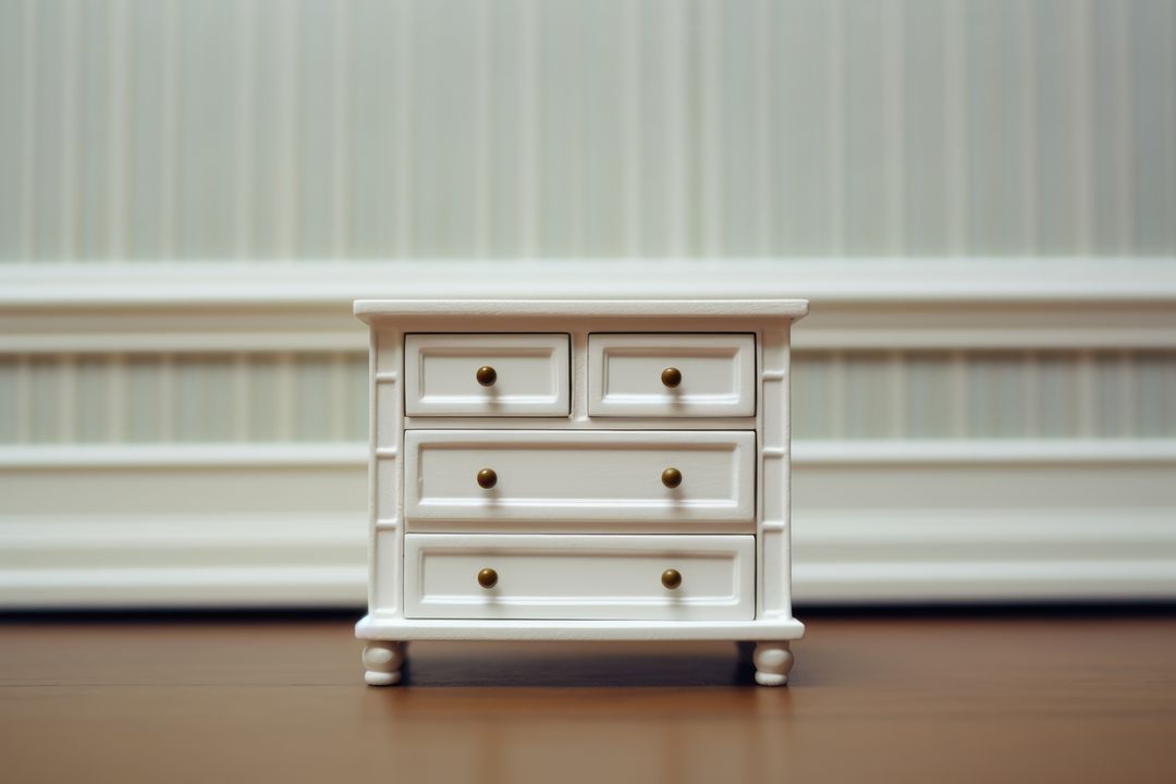 White Wooden Miniature Chest of Drawers in Neutral Setting - Free Images, Stock Photos and Pictures on Pikwizard.com