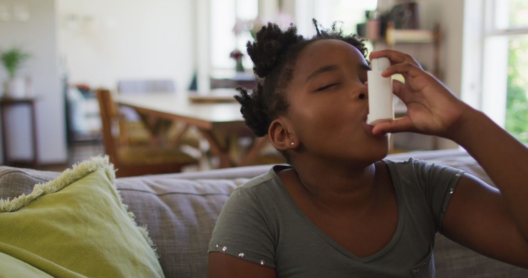 Girl Using Inhaler for Breathing