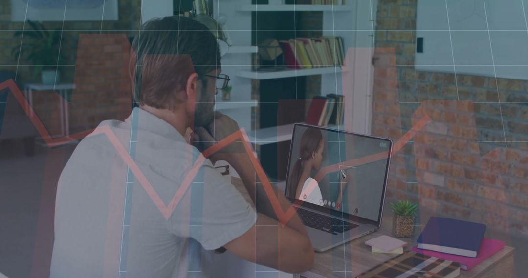 Man Engaged in Remote Video Call at Modern Home Workspace