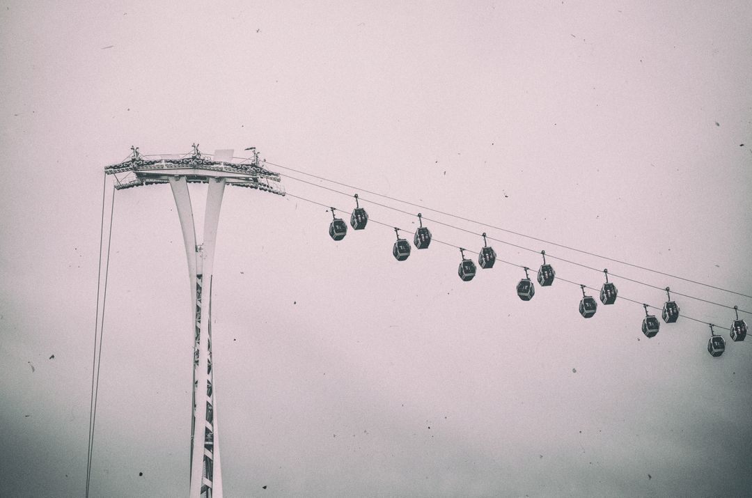 Vintage Aerial Cable Cars in Cloudy Sky - Free Images, Stock Photos and Pictures on Pikwizard.com