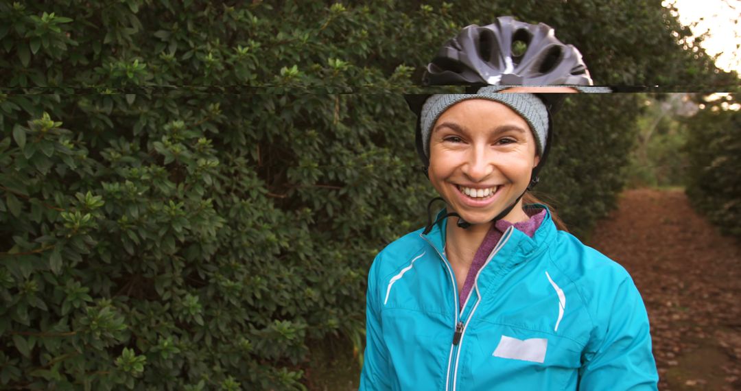 Smiling Woman Cyclist in Blue Jacket Ready for an Adventure - Free Images, Stock Photos and Pictures on Pikwizard.com