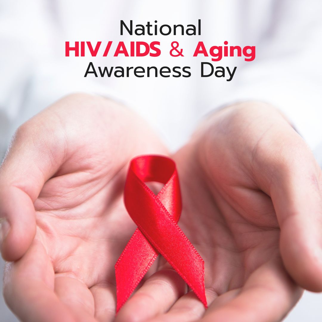 National HIV AIDS and Aging Awareness Red Ribbon in Hands