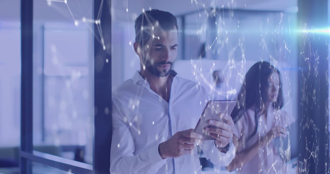 Businessman Using Tablet in Futuristic Office Environment