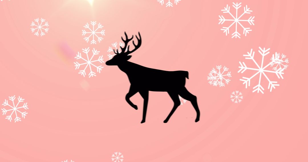 Silhouetted Reindeer with Snowflakes on Pink Background - Free Images, Stock Photos and Pictures on Pikwizard.com