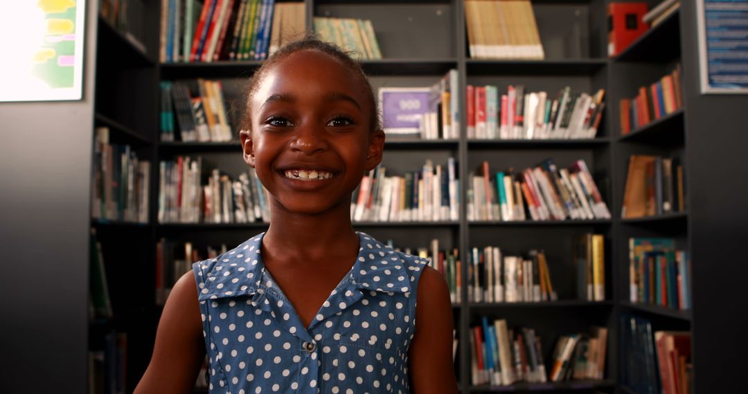 Smiling Young Girl in Library Promoting Love for Learning - Free Images, Stock Photos and Pictures on Pikwizard.com