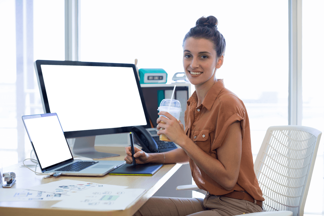 Transparent Office Designer Working on Digital Artwork