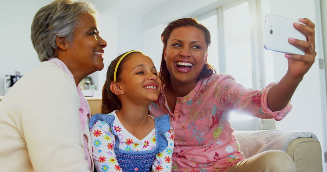 Three Generations of Women Taking Selfie and Smiling - Free Images, Stock Photos and Pictures on Pikwizard.com