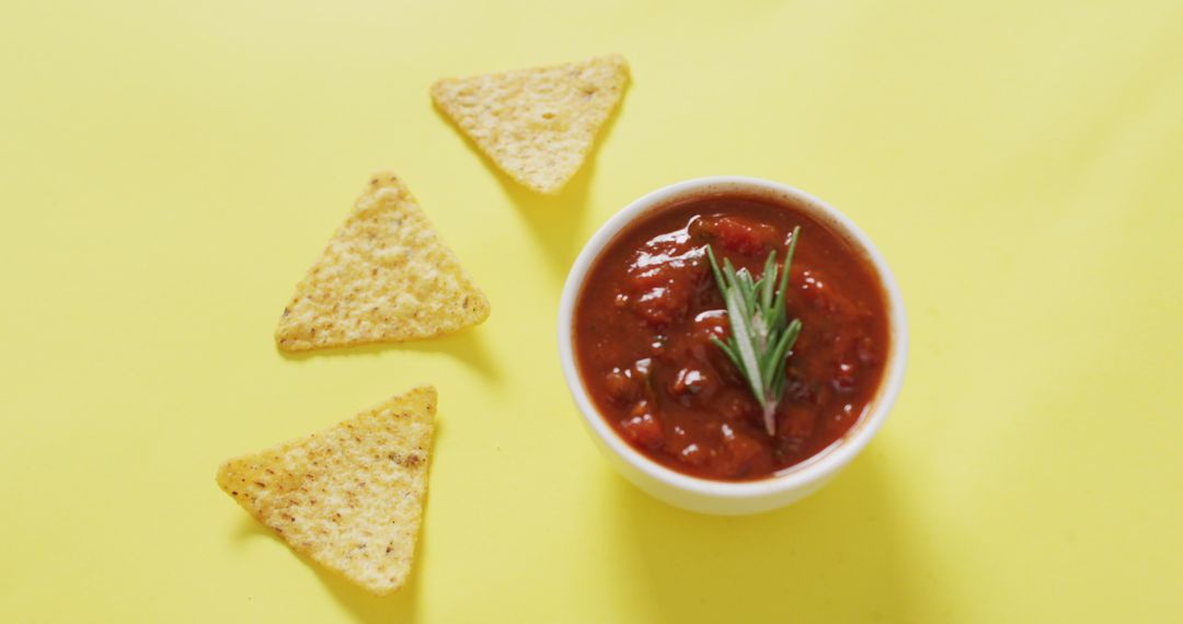 Tomato Salsa Dip with Citrus Nachos on Yellow Background - Free Images, Stock Photos and Pictures on Pikwizard.com