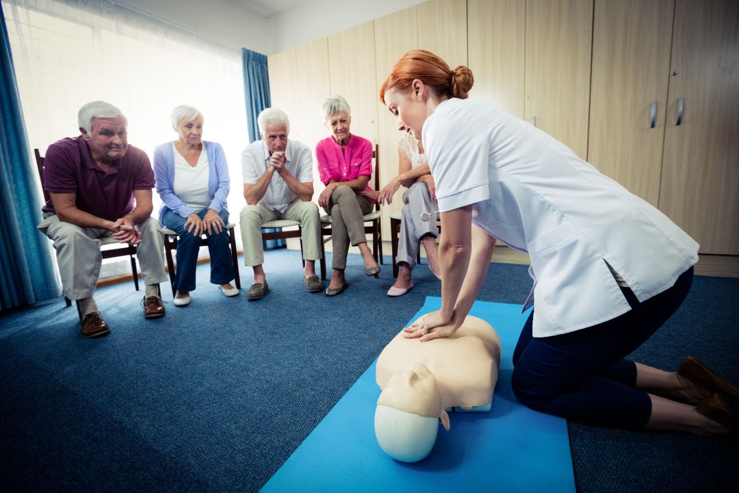 Nurse teaching first aid to a group of seniors - Free Images, Stock Photos and Pictures on Pikwizard.com