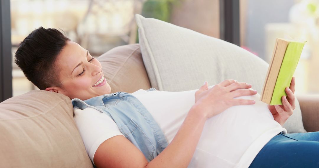 Pregnant Woman Enjoying Relaxing Time Reading Book at Home - Free Images, Stock Photos and Pictures on Pikwizard.com