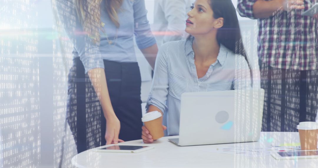 Team Collaboration in Modern Office with Digital Interface