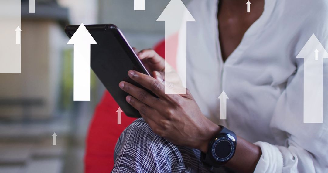 Successful Businesswoman Analyzing Data with Tablet in Office