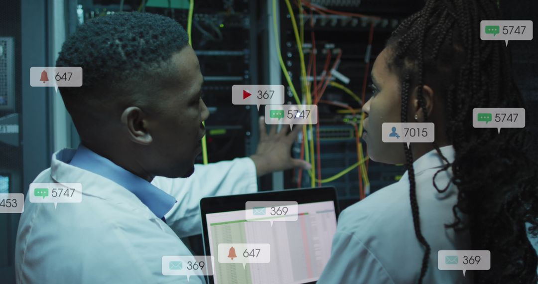 Engineers Analyzing Data Servers with Digital Overlays