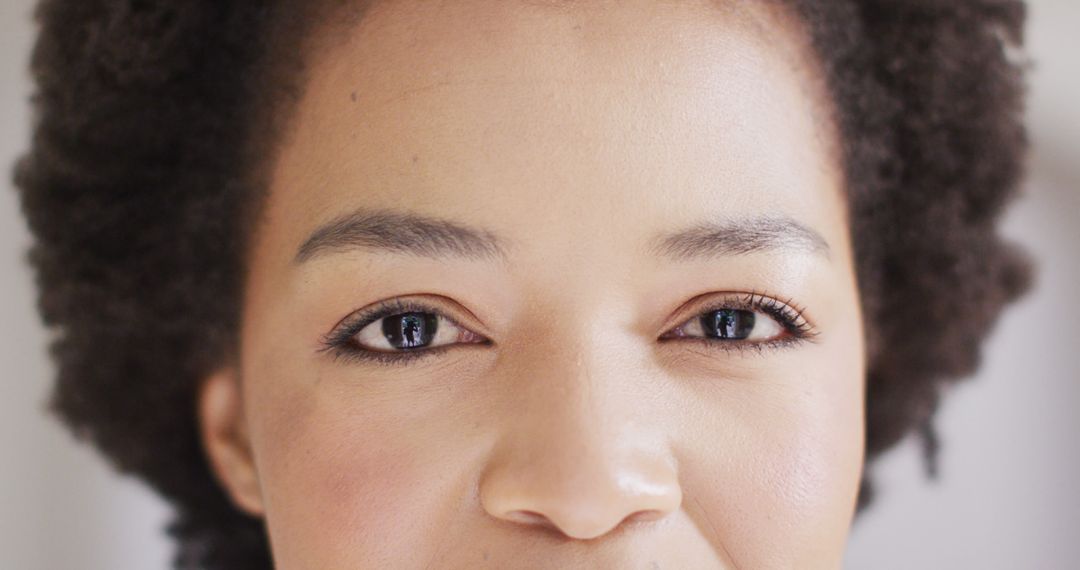 Close-Up of Confident African American Woman Smiling - Free Images, Stock Photos and Pictures on Pikwizard.com