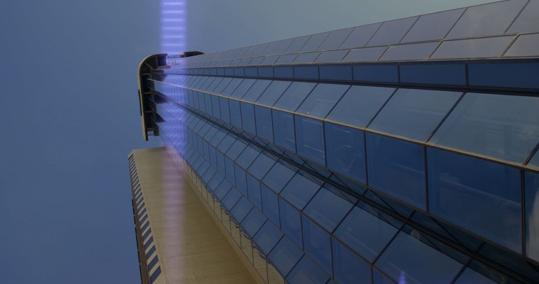 Innovative Skyscraper with Reflective Glass and LED Accent