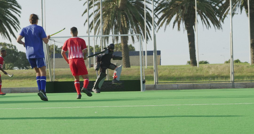 Field Hockey Players in Action During Outdoor Game - Free Images, Stock Photos and Pictures on Pikwizard.com