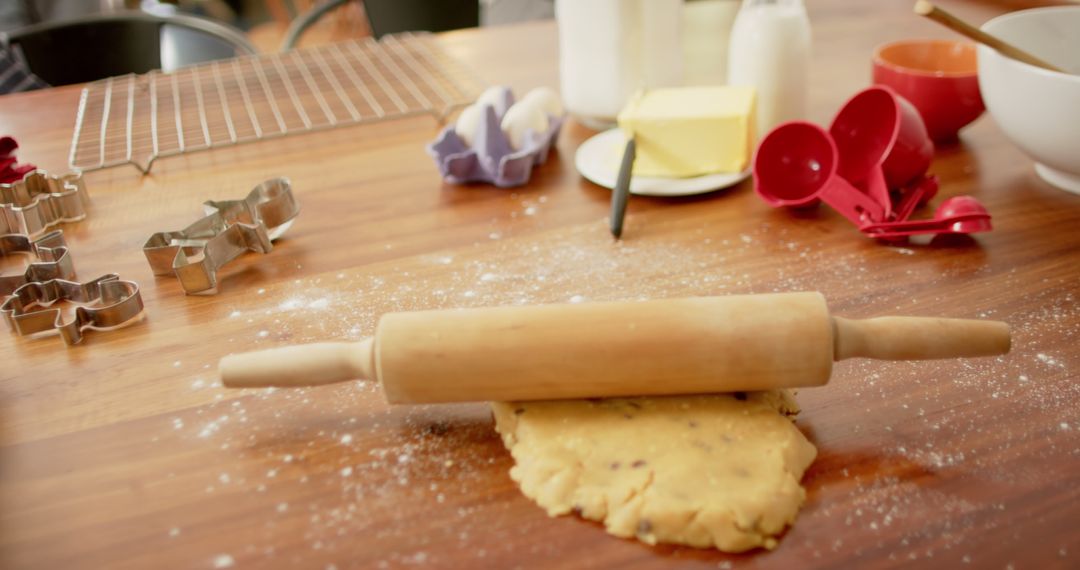 Rolling Cookie Dough on Wooden Kitchen Counter with Baking Tools - Free Images, Stock Photos and Pictures on Pikwizard.com