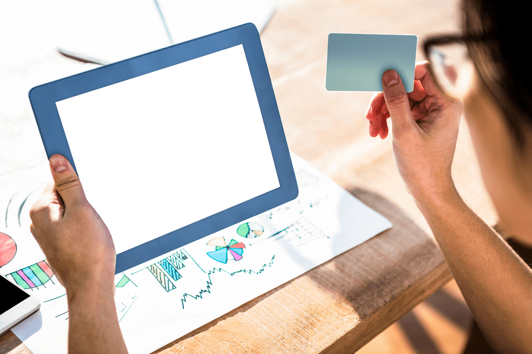 Ultra-Clear Tablet with Blank Screen and Credit Card Held by Professional
