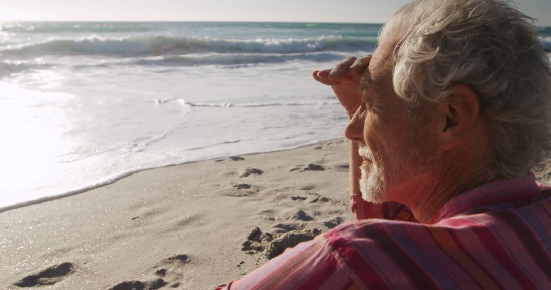 Senior Man Watching Waves at the Beach during Sunset - Free Images, Stock Photos and Pictures on Pikwizard.com