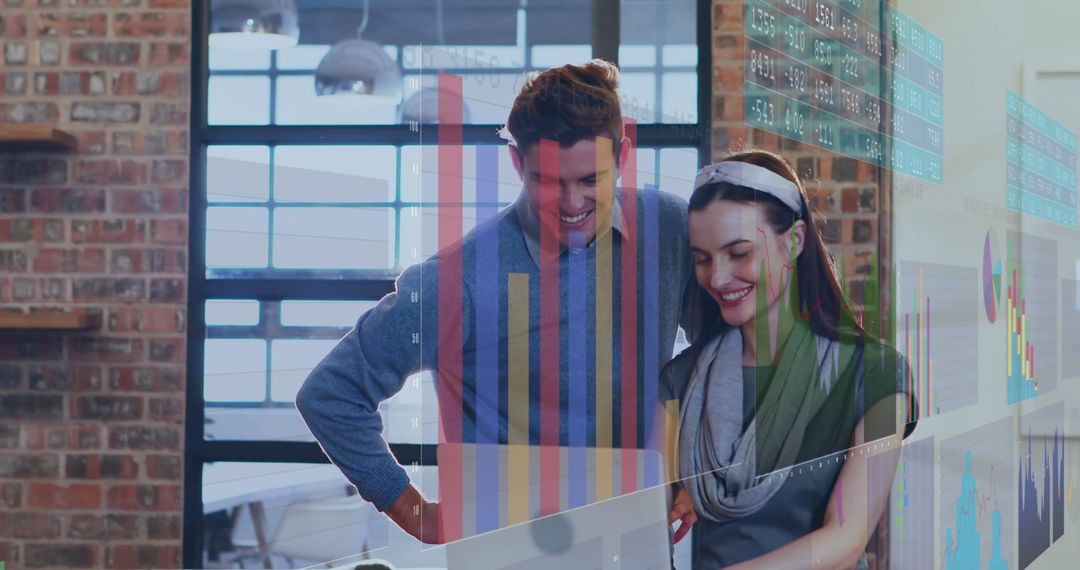 Business Colleagues Analyzing Data on Laptop with Digital Interface
