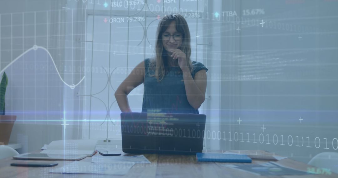 Businesswoman Analyzing Financial Data with Modern Technology