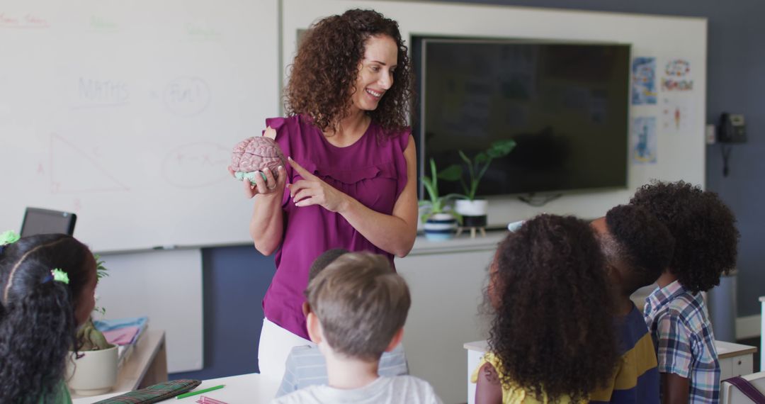 Teacher Educating Diverse Students About Human Brain in Classroom - Free Images, Stock Photos and Pictures on Pikwizard.com