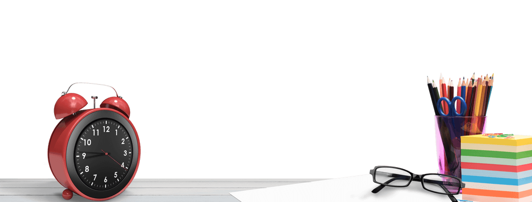 Transparent office desk with alarm clock and art supplies