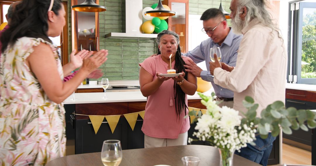 Senior Woman Celebrating Birthday with Diverse Friends at Home