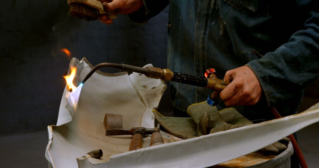 Metalworker Using Welding Torch Equipment in Workshop - Free Images, Stock Photos and Pictures on Pikwizard.com