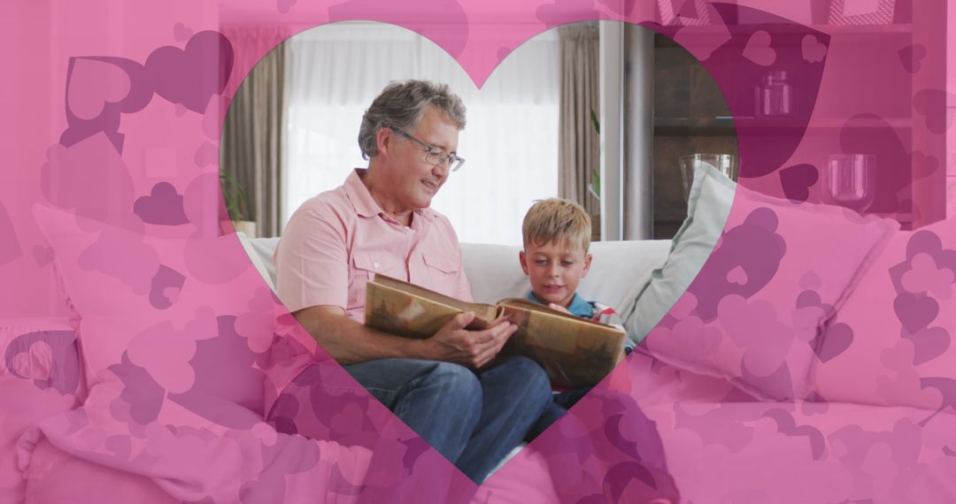 Grandfather and Grandson Reading Book with Heart Overlay