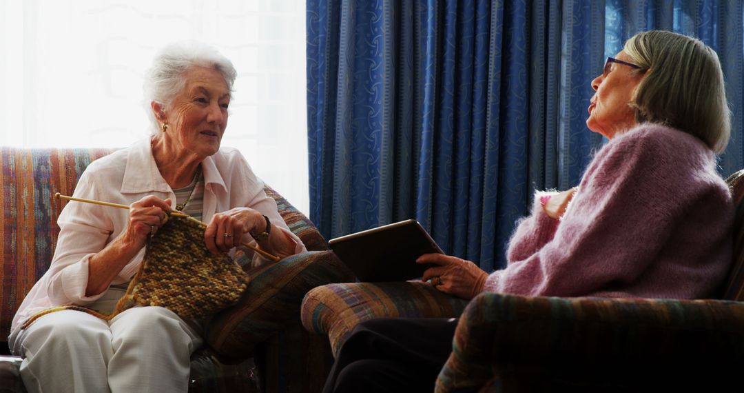 Senior Women Enjoying Knitting and Reading at Home - Free Images, Stock Photos and Pictures on Pikwizard.com