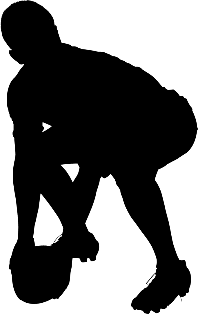 Silhouette of Rugby Player Holding Transparent Rugby Ball on Ground
