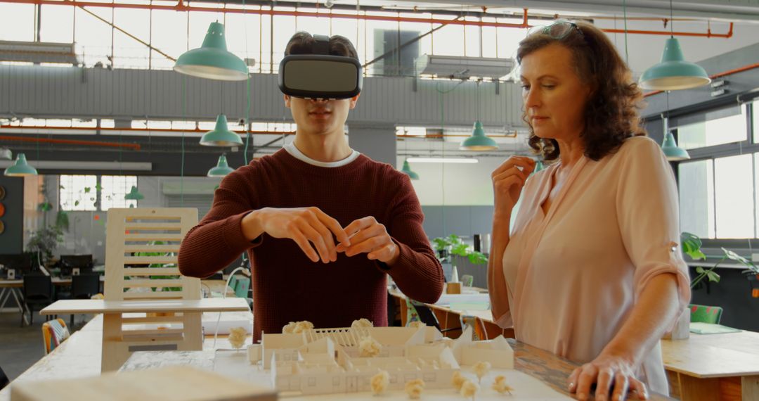 Architects Using Virtual Reality to Visualize Building Plans in Modern Office - Free Images, Stock Photos and Pictures on Pikwizard.com