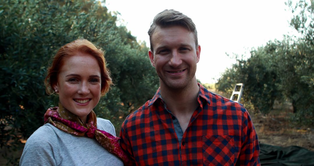 Couple Smiling in Countryside on Sunny Day - Free Images, Stock Photos and Pictures on Pikwizard.com