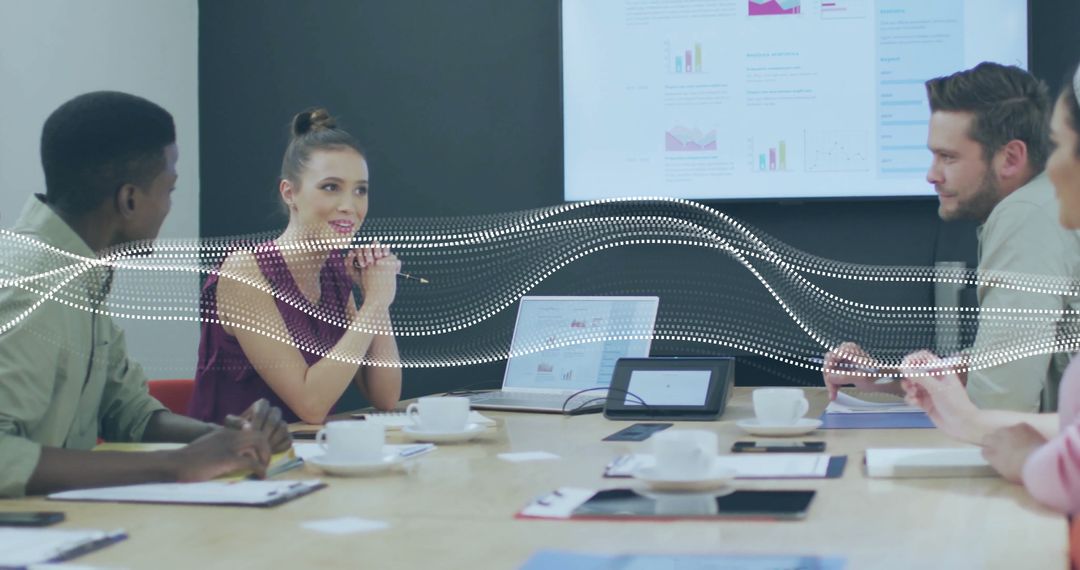 Diverse Team Engaging in Modern Office Meeting with Digital Overlay