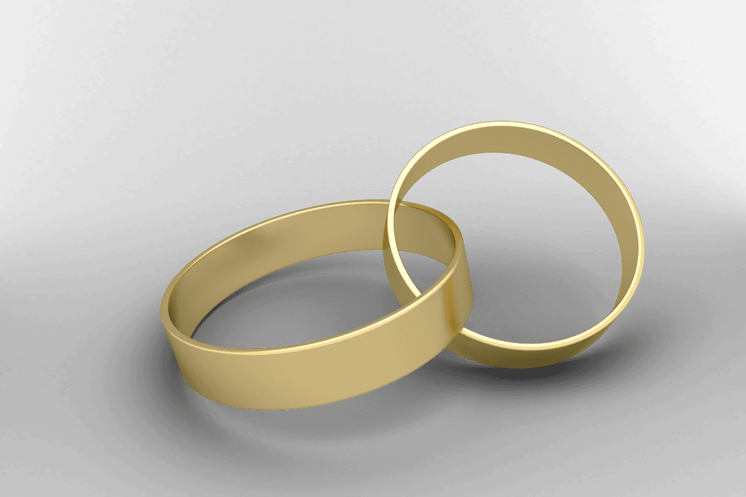 Transparent Overlapping Gold Wedding Rings on Black Background